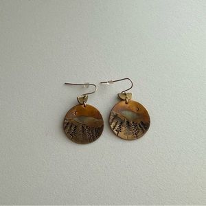 Dangly earrings with tree and mountain design 🤎